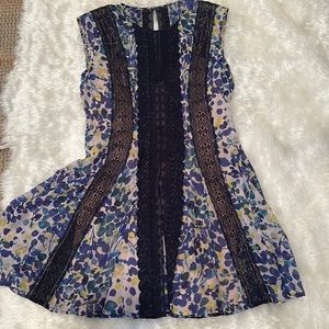 Beautiful light floral/ lace dress with attached nude lining.